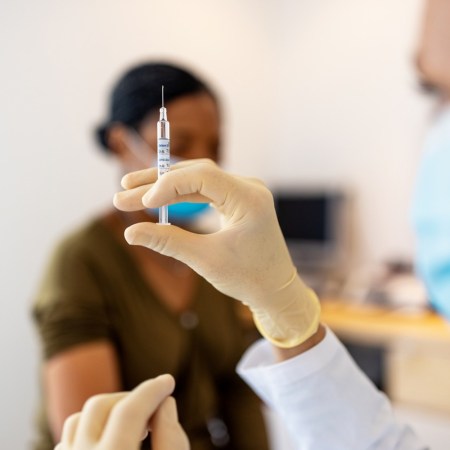 Doctor with injection