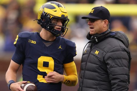 Ex-Michigan Wolverines Jim Harbaugh and J.J. McCarthy.
