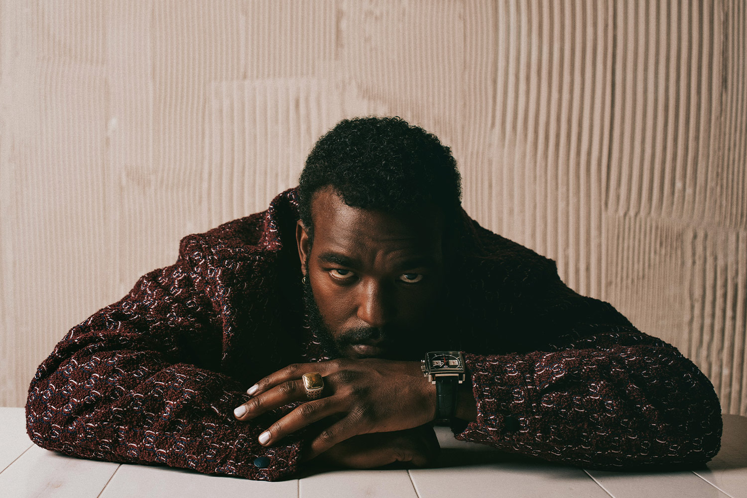 Luke James, wearing Gucci. We spoke with the actor ahead of his appearance in Prime Video's "THEM: The Scare"