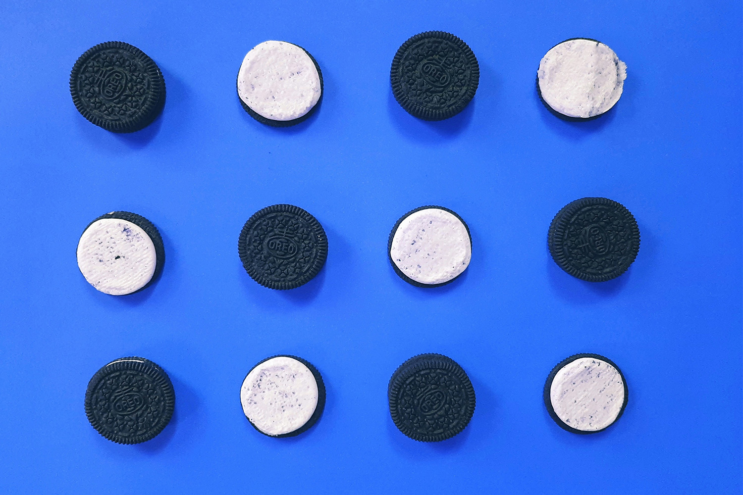 A bunch of Oreos against a blue background. We tested these snack cookies and other junk foods to see which ones are best as pre-workout fuel.