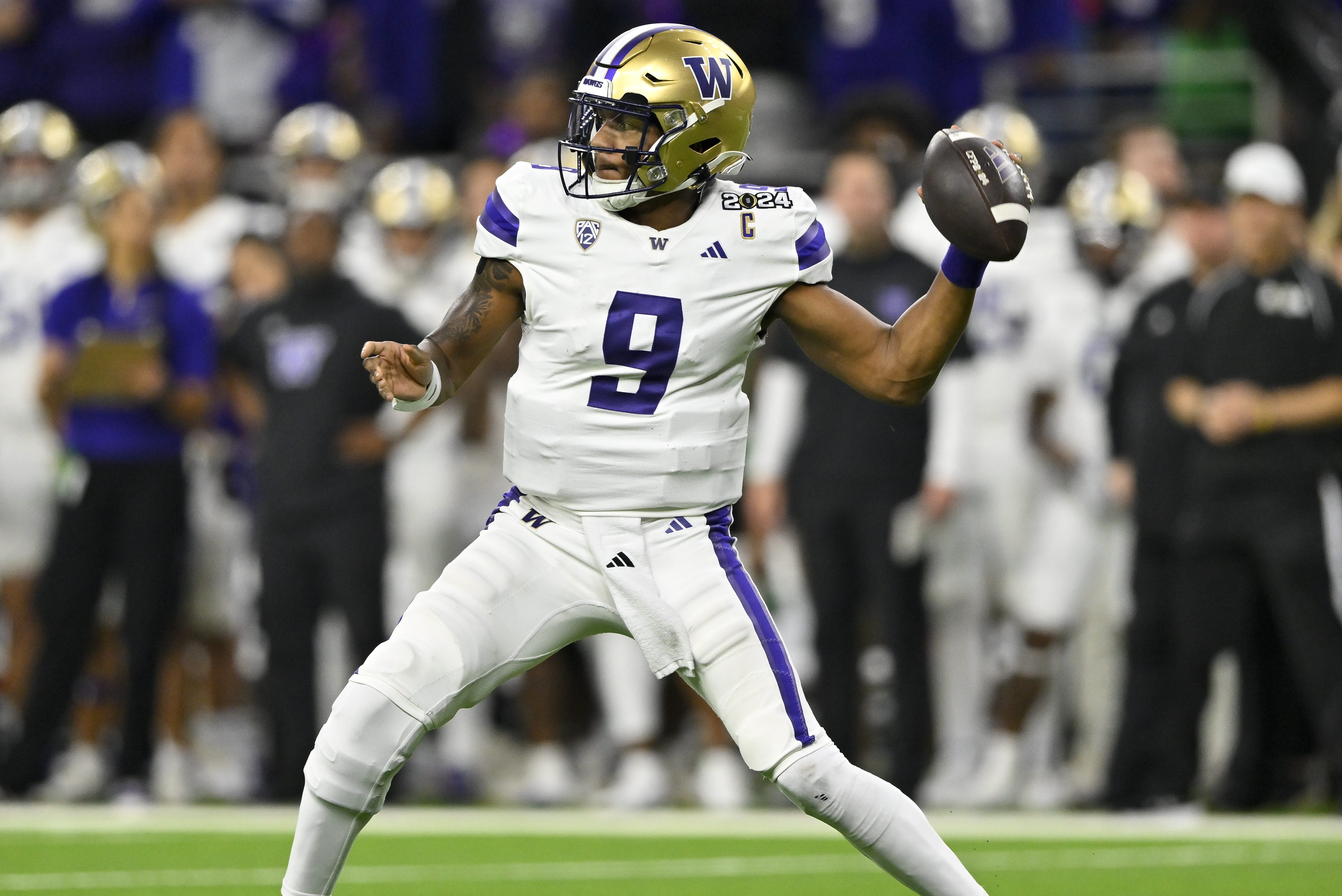 Michael Penix Jr. throws the ball.