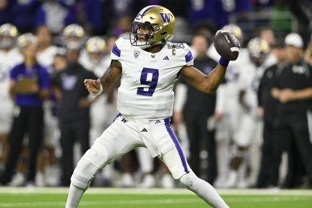 Michael Penix Jr. throws the ball.