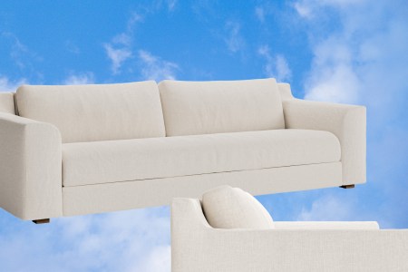 The Sabai Sleeper Sofa against a background of blue sky and clouds.