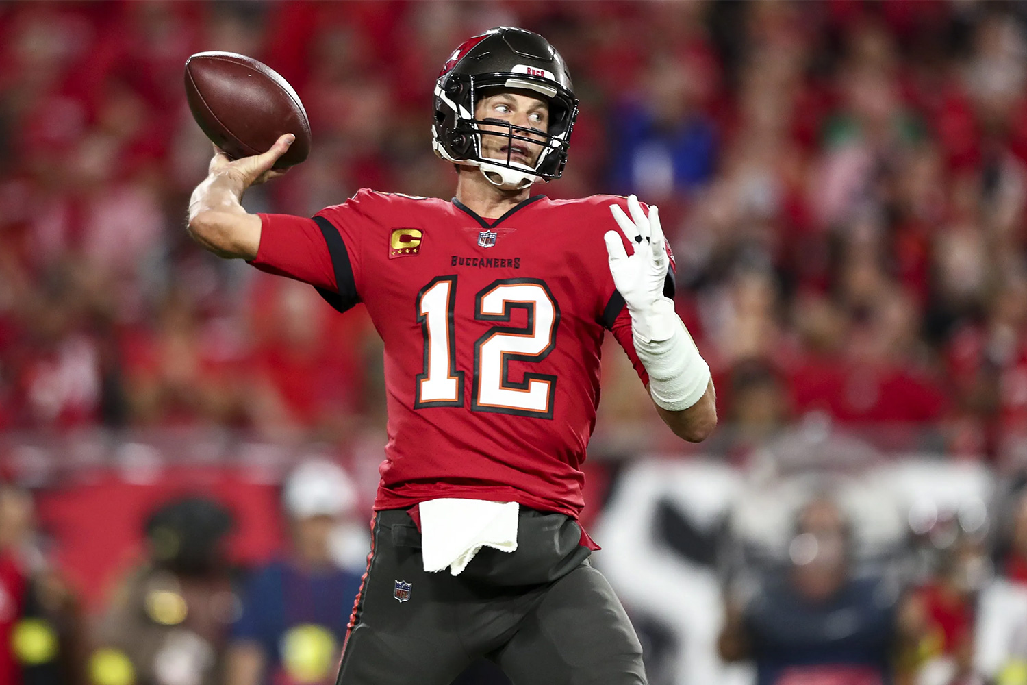 Tom Brady throwing a pass for the Tampa Bay Buccaneers.