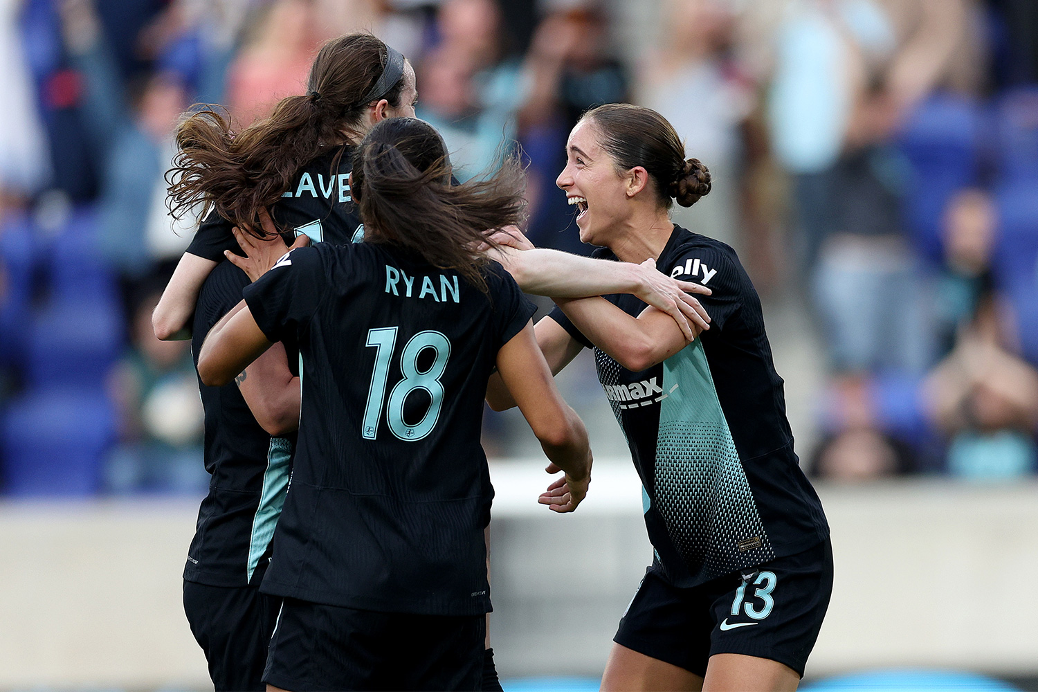 Ella Stevens celebrates a goal scored by Gotham FC teammate Rose Lavelle
