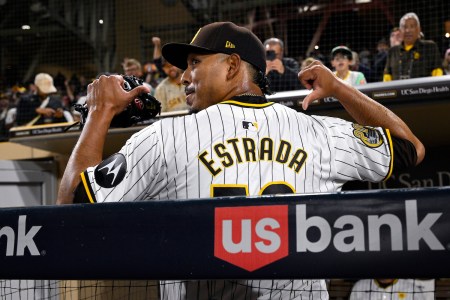 Jeremiah Estrada of the Padres celebrates after striking out the Marlins.