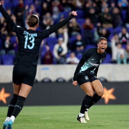 Lynn Williams #10 of the NJ/NY Gotham FC celebrates with teammate Ella Stevens #13 after Williams scored a goal against the North Carolina Courage during the first half at Red Bull Arena on May 04, 2024 in Harrison, New Jersey.