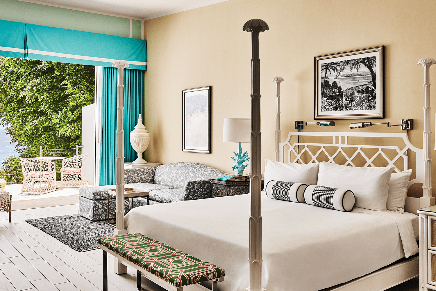 A three-bedroom suite awash in white linens and bold patterns