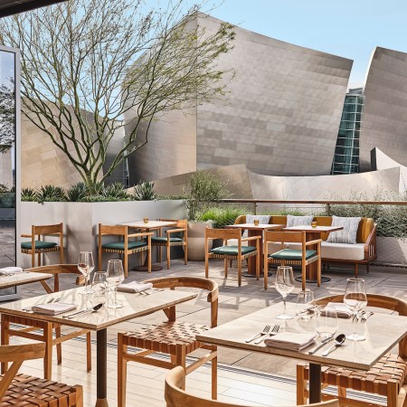 Outdoor seating at Jose Andres's San Laurel, situated beside the Walt Disney Concert Hall.