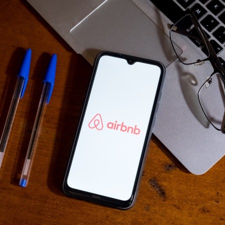 Airbnb logo on phone