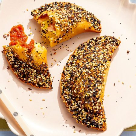 A bacon, egg and cheese in the form of an empanada.