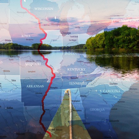 A canoe facing down the Mississippi River. If you're looking for a bucket list adventure, you should consider paddling the great river.