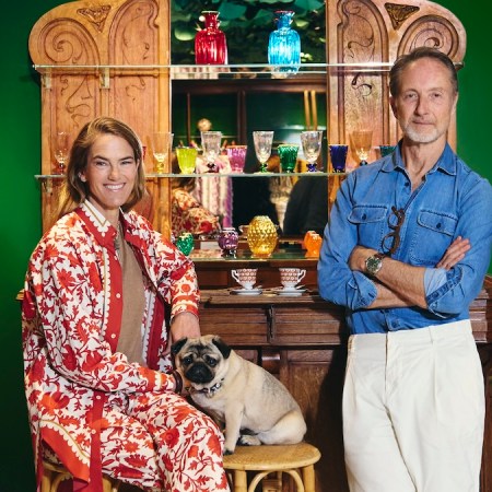 JJ Martins and Adam Brown, posing with a pug