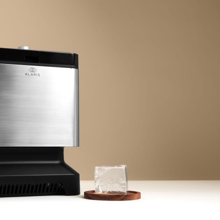 Klaris clear ice machine with a block of clear ice to the side
