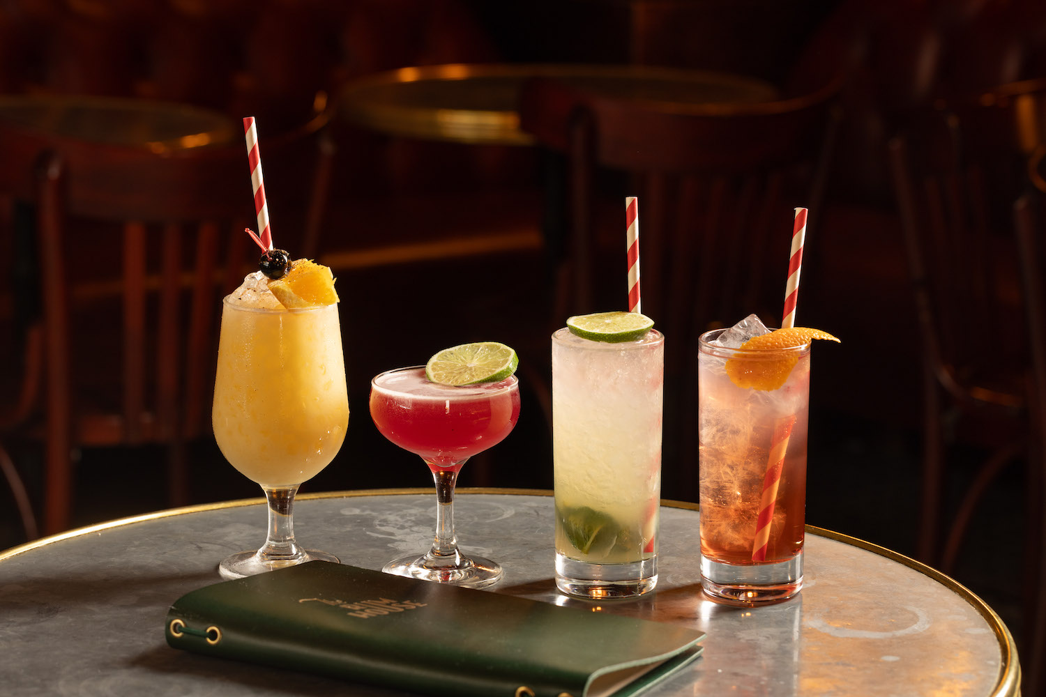 Four cocktails on a table