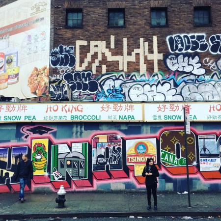 Allen St's iconic "Greetings from Chinatown" mural