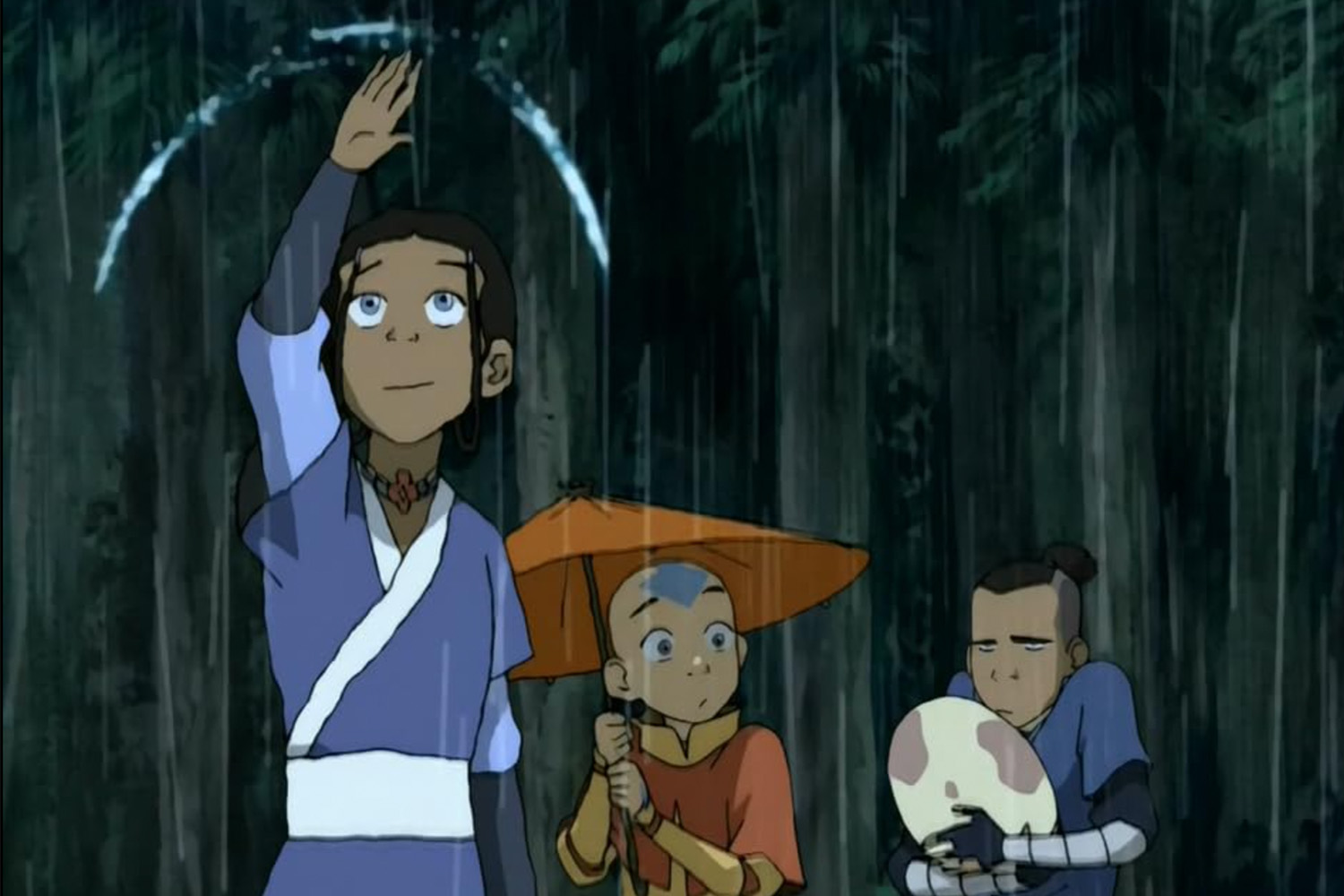 A still from "Avatar: The Last Airbender," showing Katara waterbending in the rain.