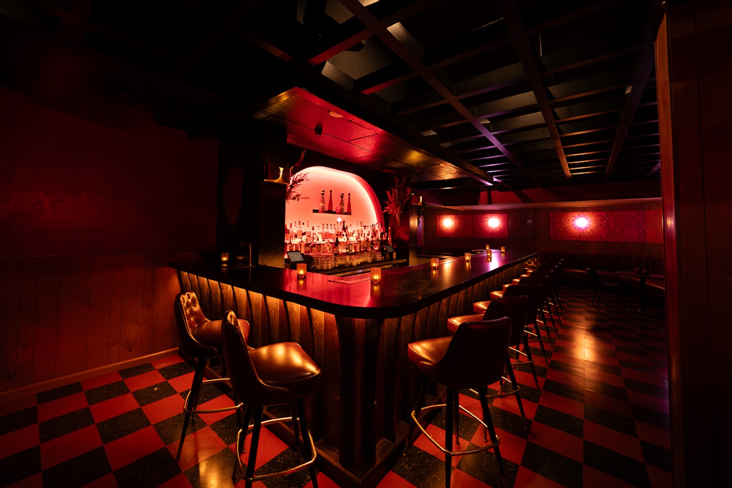 Blind Barber's speakeasy-style bar room, hidden behind a fully functional barber shop