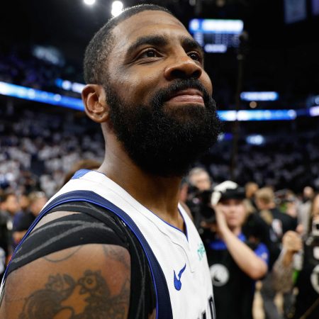 Kyrie Irving celebrates after a victory against the Minnesota Timberwolves.