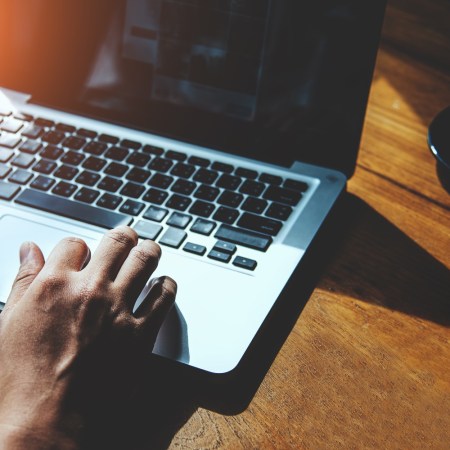 Typing on laptop