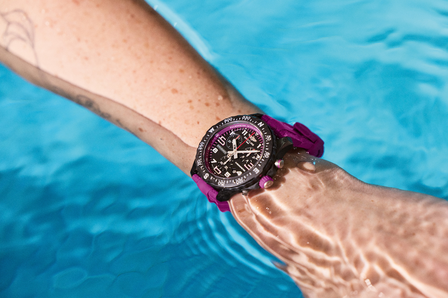 The Breitling Endurance Pro 38, featuring a purple rubber band