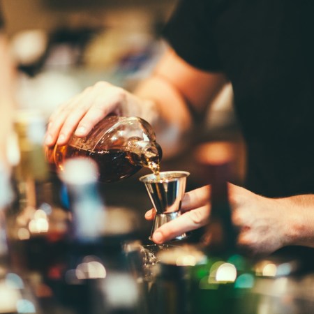 Bartender making drinks