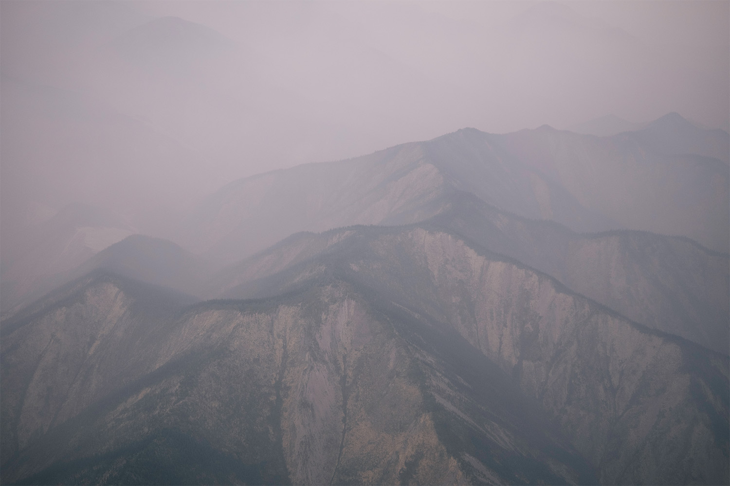A hazy view of the mountaintops.