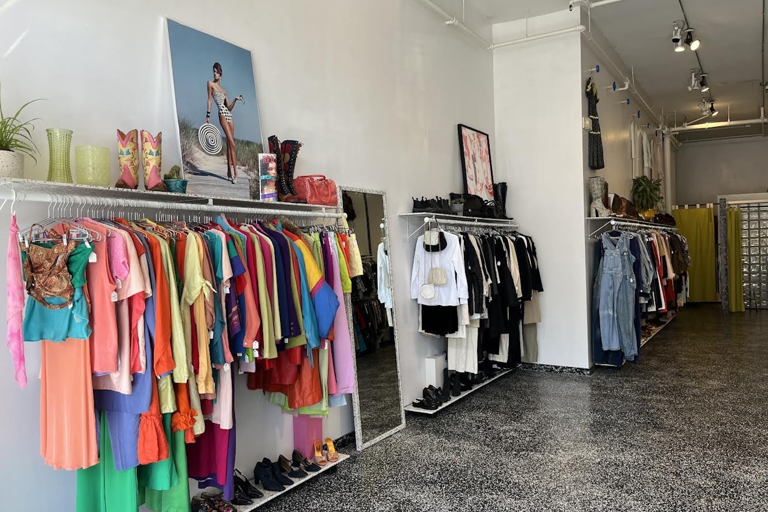 Colorful racks of clothing inside of No Shop and Nowhere