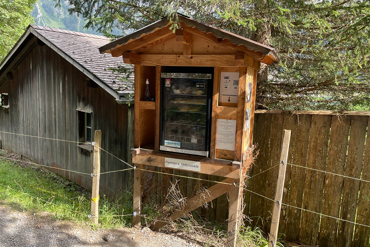 A self-serve cheese fridge
