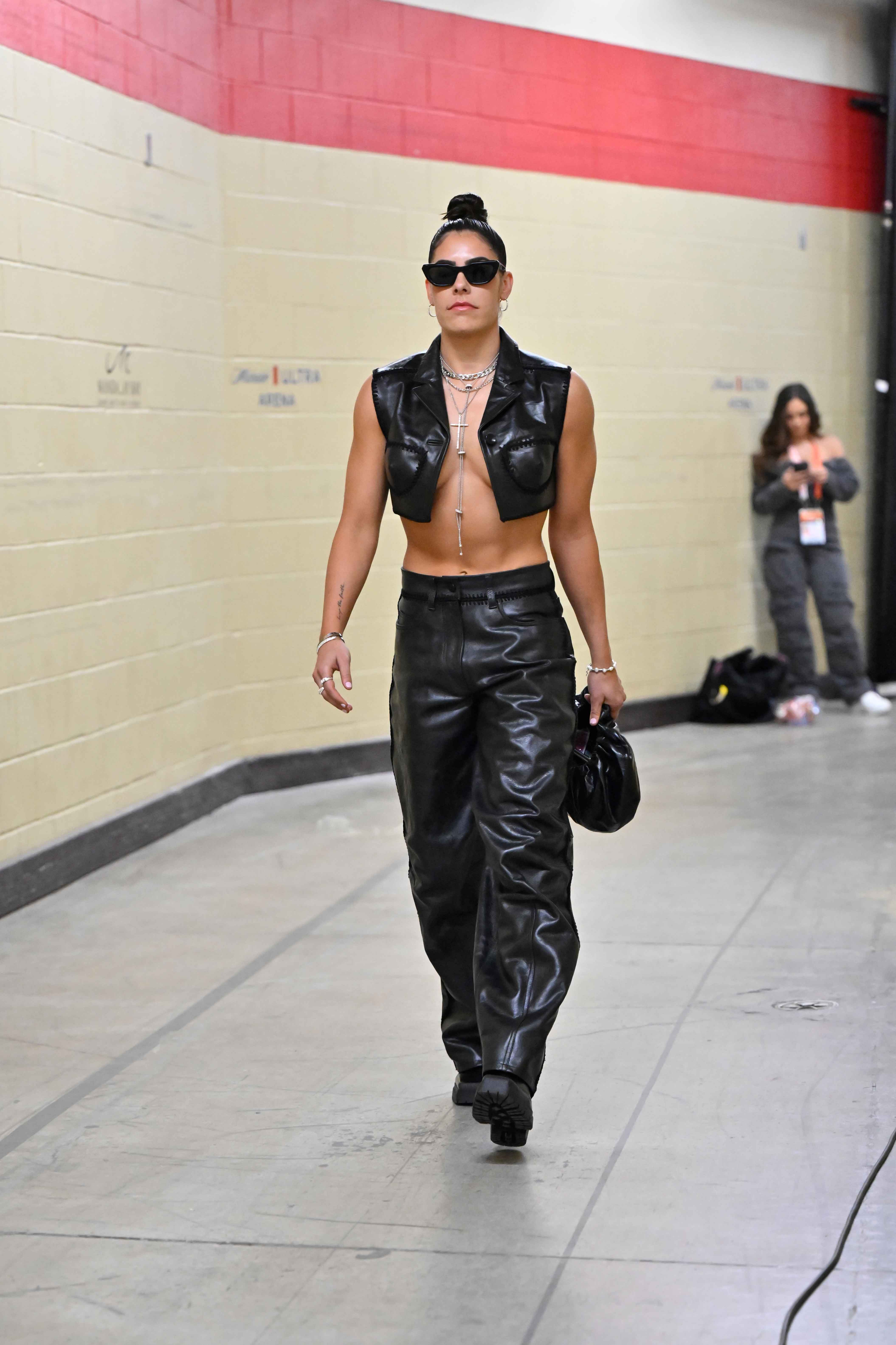 LAS VEGAS, NV - MAY 14: Kelsey Plum #10 of the Las Vegas Aces arrives to the arena before the game against the Phoenix Mercury on May 14, 2024 at Michelob ULTRA Arena in Las Vegas, Nevada. (Photo by David Becker/NBAE via Getty Images)