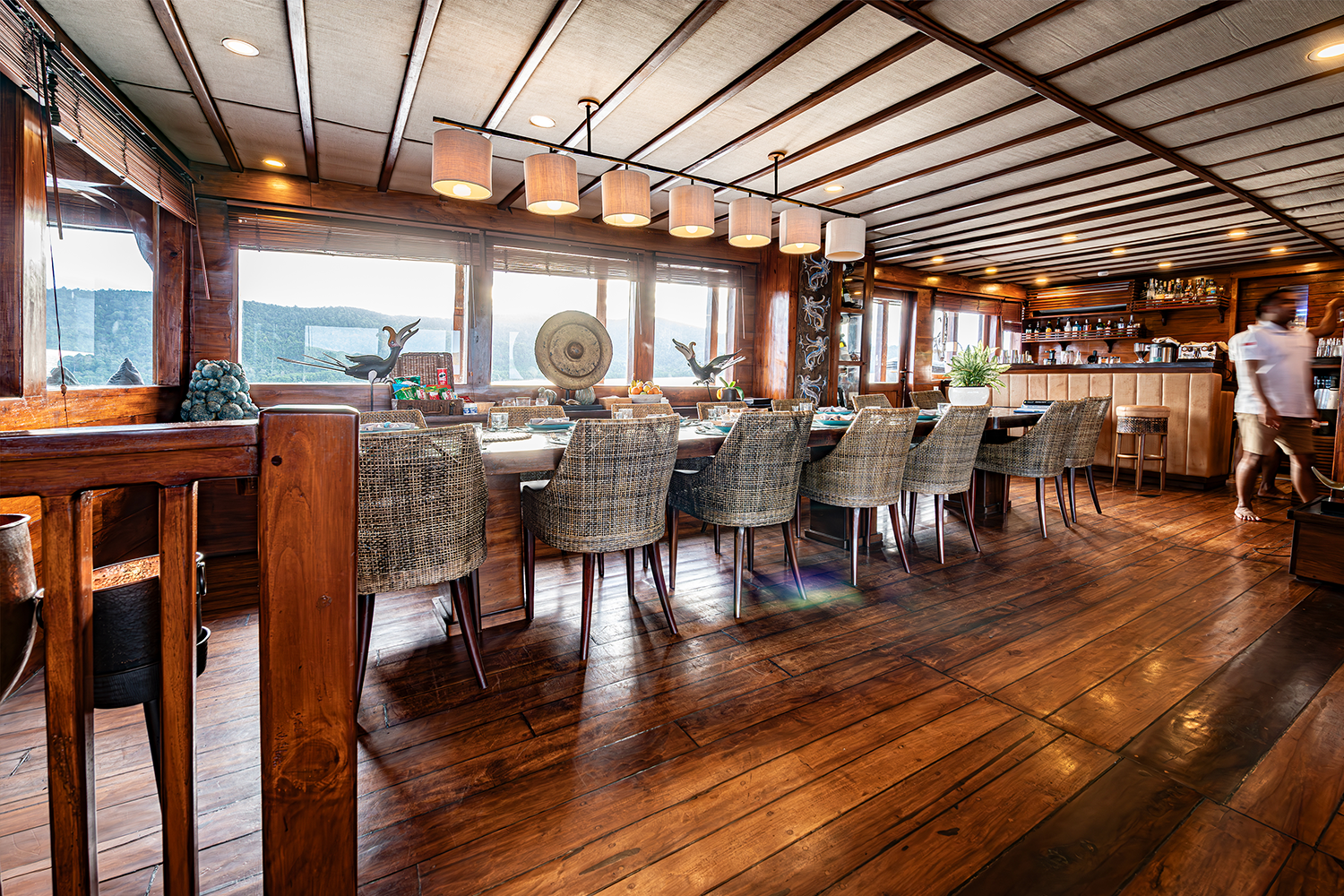Natural light floods the indoor dining room aboard Prana