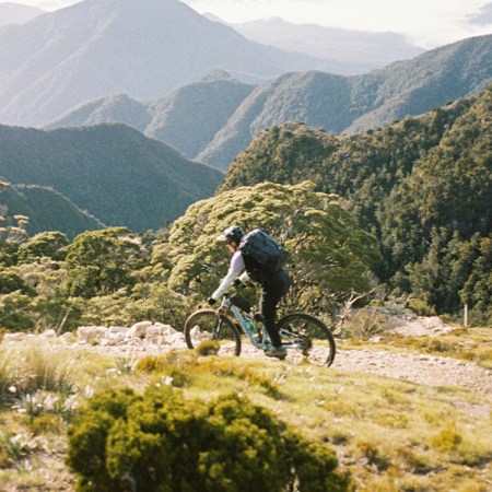 A cyclist on New Zealand's Old Ghost Road.