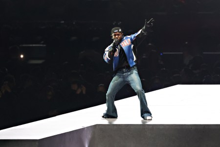 Kendrick Lamar performing in bootcut jeans during the Super Bowl LIX Halftime Show
