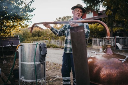 A man making moonshine at home