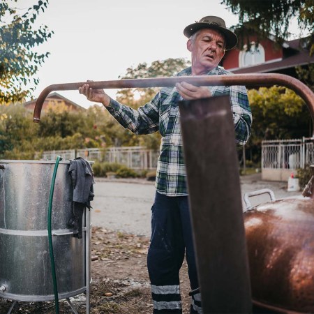 A man making moonshine at home