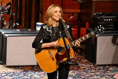 Sheryl Crow performing on stage