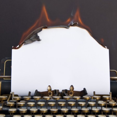typewriter with flames