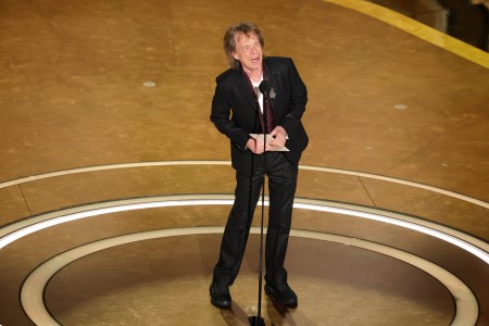 Mick Jagger speaks onstage during the 97th Annual Oscars