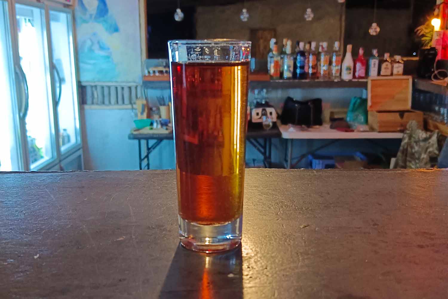 Lao Khao in a glass on a bar top