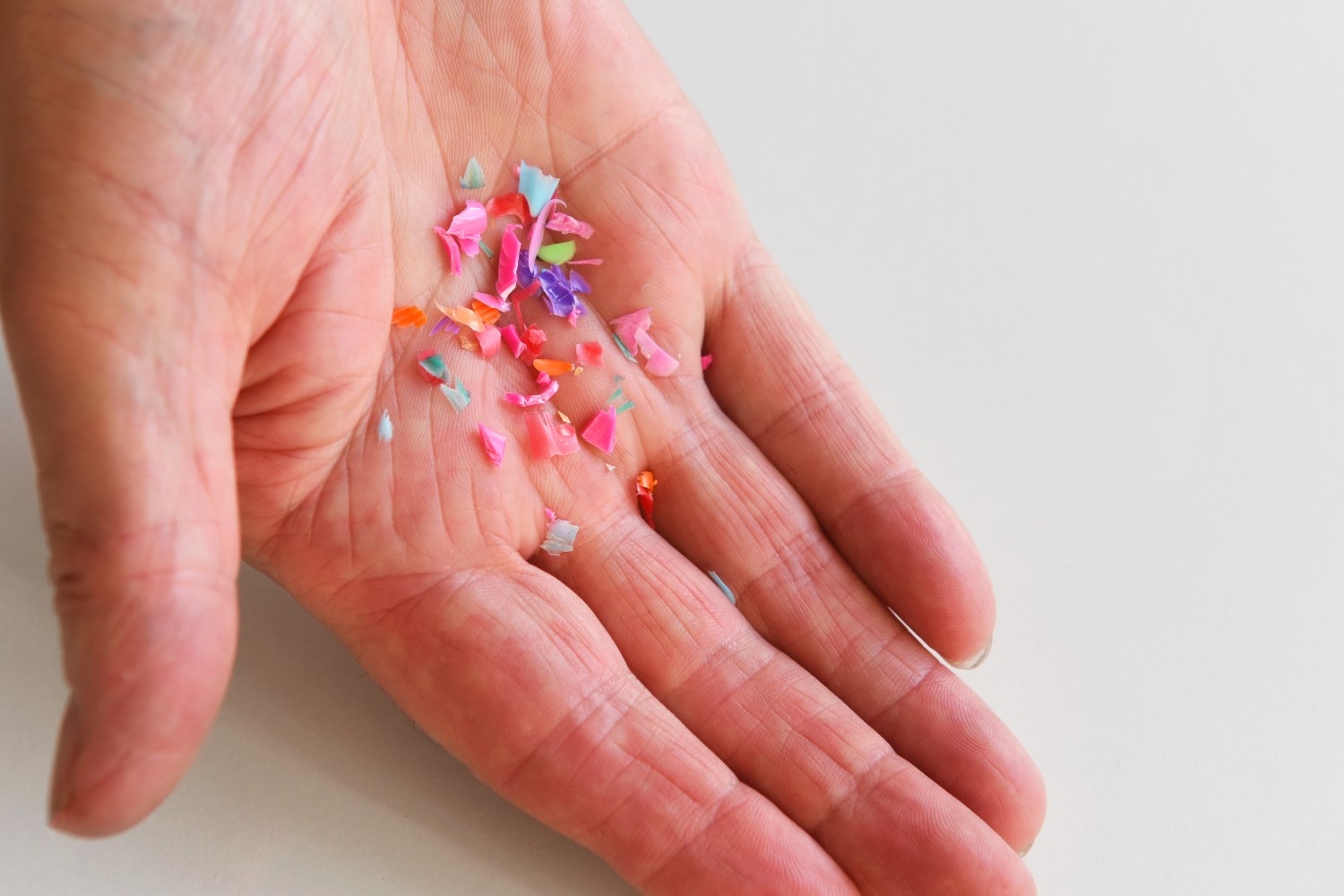 Hand holding plastics