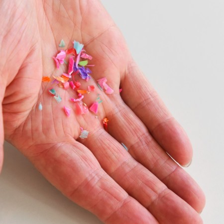 Hand holding plastics