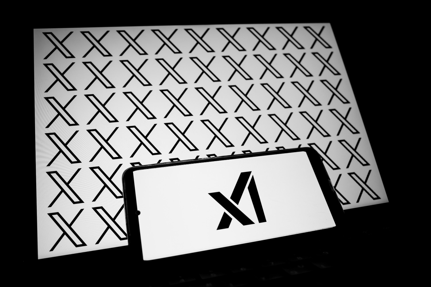 X and xAI logos