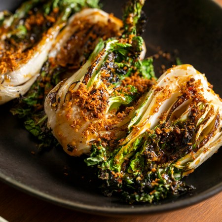 The charcoal-grilled bok choy with anchovy oyster sauce from Bangkok Supper Club