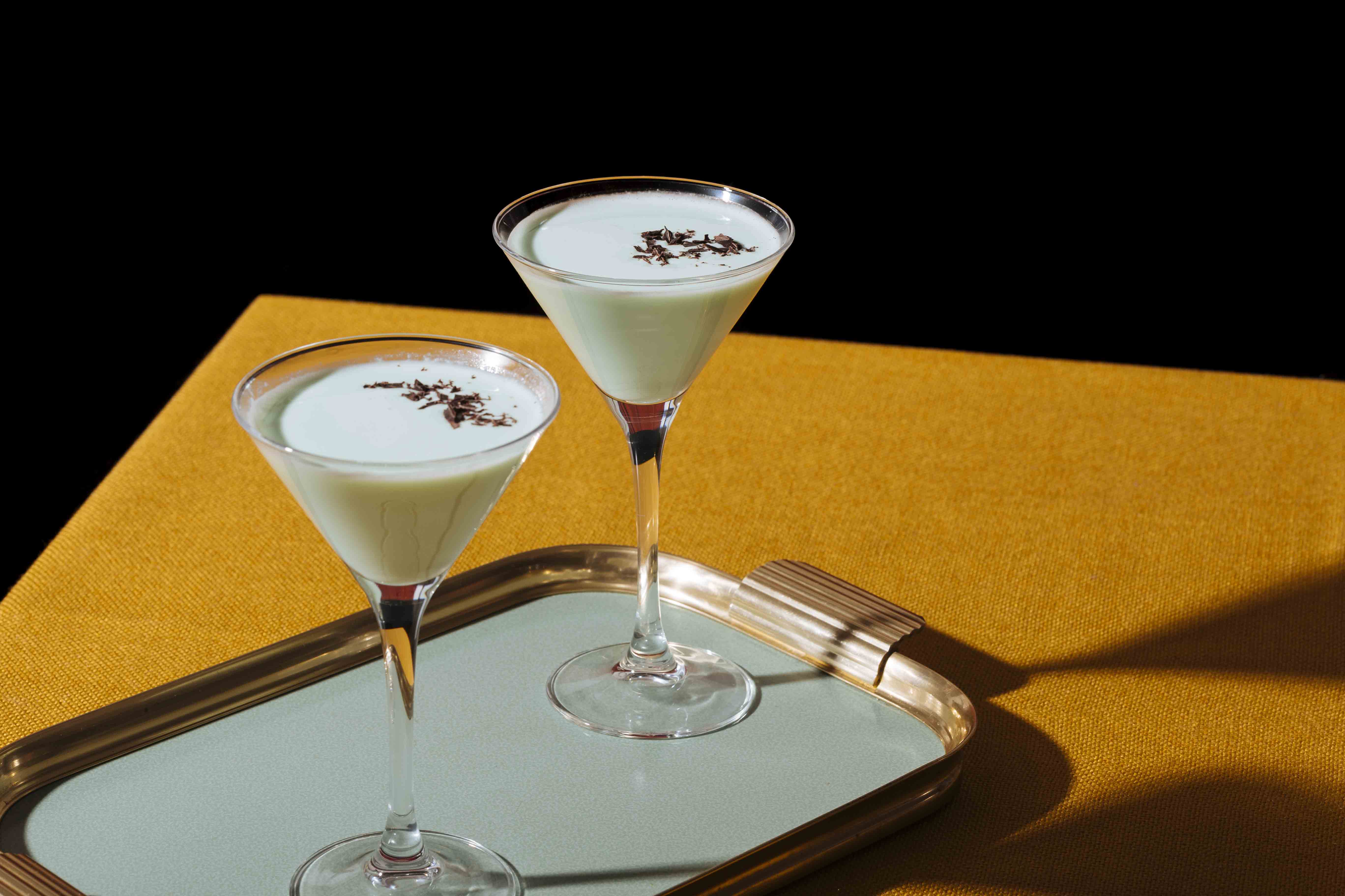 The Grasshopper, an old classic from New Orleans, with green creme de menthe. white creme de cacao and light cream
