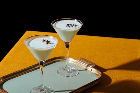 The Grasshopper, an old classic from New Orleans, with green creme de menthe. white creme de cacao and light cream
