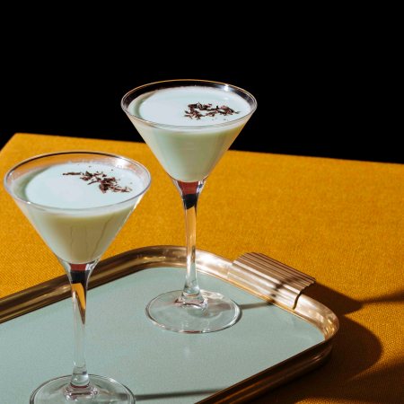 The Grasshopper, an old classic from New Orleans, with green creme de menthe. white creme de cacao and light cream