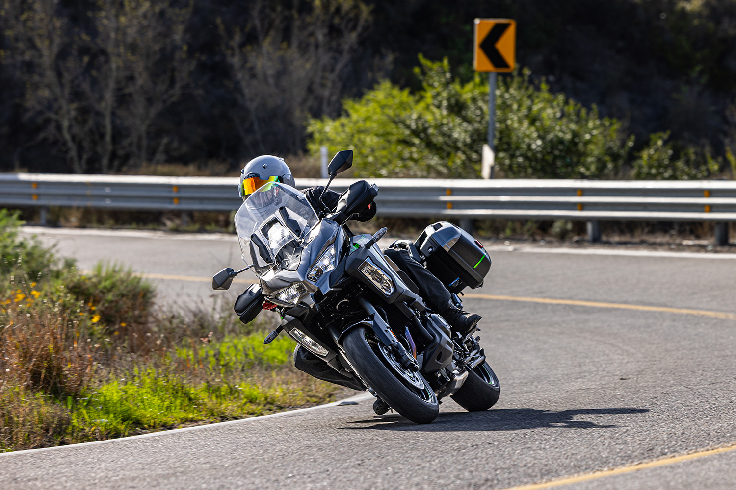 Basem Wasef leaning his Kawasaki sport tourer on a corner on Mexican roads