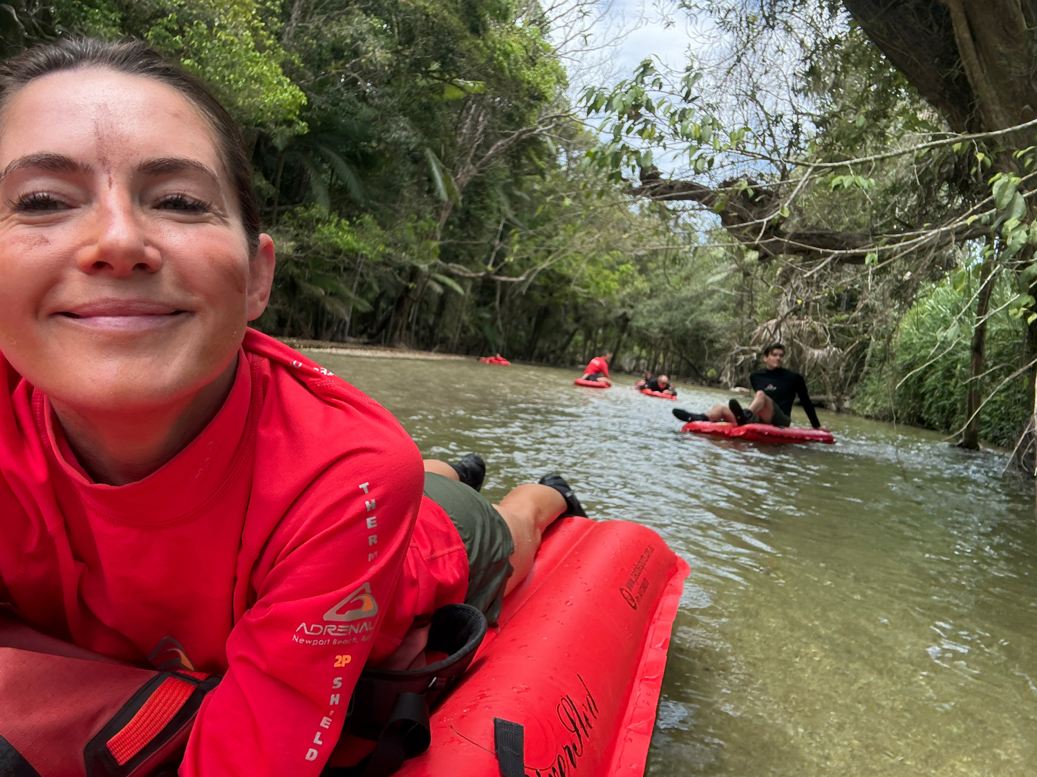 Reporter Kinga Philipps floats down a river in the Daintree Rainforest in North Queensland