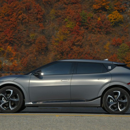 A Hyundai EV sitting on the side of the road