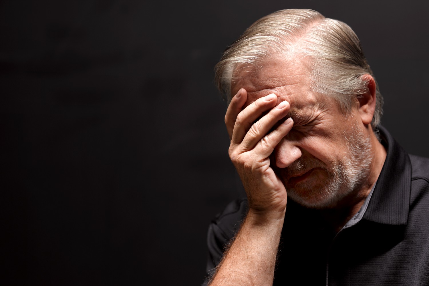 Older man looking frustrated